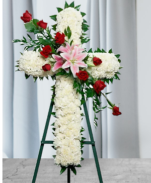 CROSS OF RED ROSES &amp; PINK LILY'S ON A WHITE BASE.
